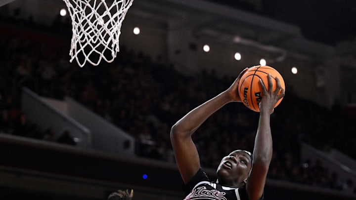Mar 24, 2025; Los Angeles, California, USA; Mississippi State Bulldogs center Madina Okot (15) grabs a rebound past USC Trojans center Rayah Marshall (13) during an NCAA Tournament second round game at Galen Center. Mandatory Credit: Robert Hanashiro-Imagn Images