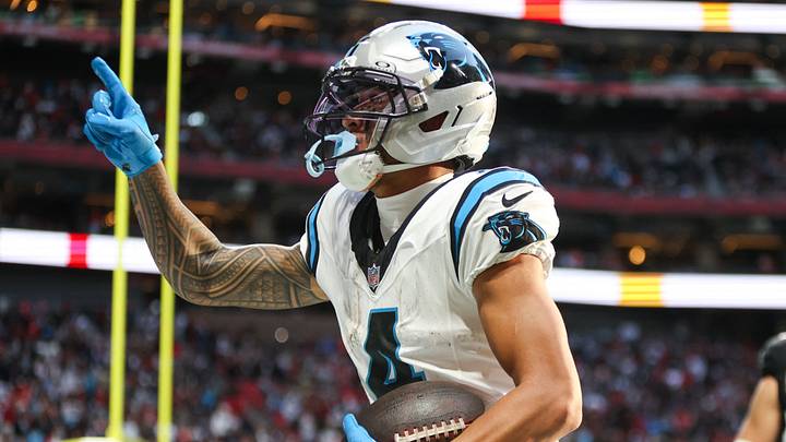 Carolina Panthers wide receiver Tetairoa McMillan (4) celebrates a touchdown in the fourth quarter against the Atlanta Falcons at Mercedes-Benz Stadium. Carolina Panthers wide receiver Tetairoa McMillan (4) celebrates a touchdown in the fourth quarter against the Atlanta Falcons at Mercedes-Benz Stadium.