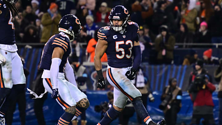 Dec 26, 2024; Chicago, Illinois, USA; Chicago Bears linebacker T.J. Edwards (53) and cornerback Kyler Gordon (6) celebrate a defensive stop against the Seattle Seahawks during the fourth quarter at Soldier Field. Mandatory Credit: Daniel Bartel-Imagn Images