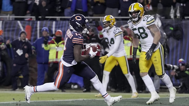 Jan 10, 2026; Chicago, IL, USA; Chicago Bears wide receiver Olamide Zaccheaus (14) scores a touchdown against the Green Bay Packers during the fourth quarter of an NFC Wild Card Round game at Soldier Field. Mandatory Credit: Mark Hoffman/USA TODAY Network via Imagn Images Jan 10, 2026; Chicago, IL, USA; Chicago Bears wide receiver Olamide Zaccheaus (14) scores a touchdown against the Green Bay Packers during the fourth quarter of an NFC Wild Card Round game at Soldier Field. Mandatory Credit: Mark Hoffman/USA TODAY Network via Imagn Images