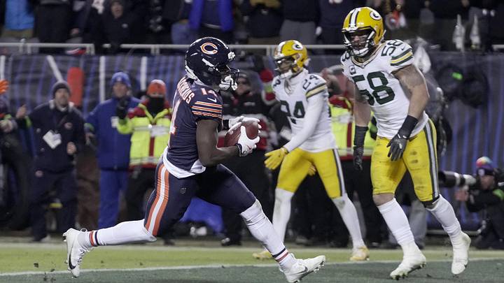 Jan 10, 2026; Chicago, IL, USA; Chicago Bears wide receiver Olamide Zaccheaus (14) scores a touchdown against the Green Bay Packers during the fourth quarter of an NFC Wild Card Round game at Soldier Field. Mandatory Credit: Mark Hoffman/USA TODAY Network via Imagn Images
