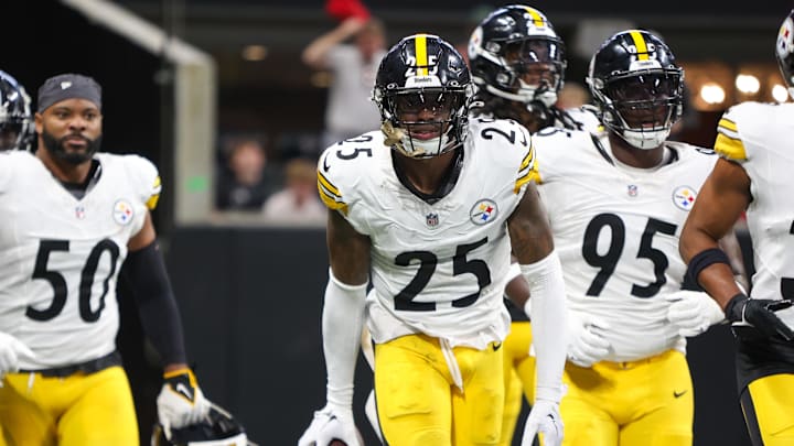 Sep 8, 2024; Atlanta, Georgia, USA; Pittsburgh Steelers safety DeShon Elliott (25) celebrates with teammates after an interception against the Atlanta Falcons in the first quarter at Mercedes-Benz Stadium. Mandatory Credit: Brett Davis-Imagn Images