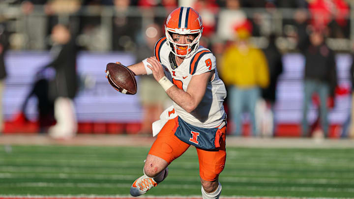 Nov 23, 2024; Piscataway, New Jersey, USA; Illinois Fighting Illini quarterback Luke Altmyer (9) scrambles during the second half against the Rutgers Scarlet Knights at SHI Stadium. Mandatory Credit: Vincent Carchietta-Imagn Images Nov 23, 2024; Piscataway, New Jersey, USA; Illinois Fighting Illini quarterback Luke Altmyer (9) scrambles during the second half against the Rutgers Scarlet Knights at SHI Stadium. Mandatory Credit: Vincent Carchietta-Imagn Images