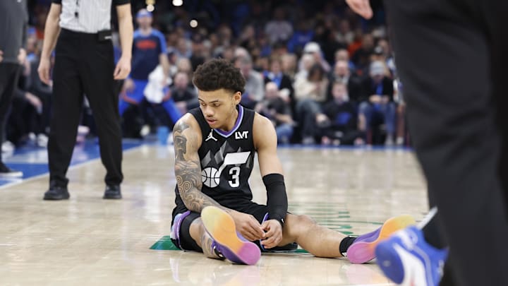 Jan 22, 2025; Oklahoma City, Oklahoma, USA; Utah Jazz guard Keyonte George (3) looks down after falling on a play against the Oklahoma City Thunder during the second half at Paycom Center. Mandatory Credit: Alonzo Adams-Imagn Images
