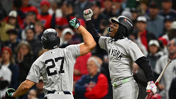 Giancarlo Stanton & Jazz Chisholm Jr. celebrate a home run in the American League Championship Series - New York Yankees v Cleveland Guardians - Game 3