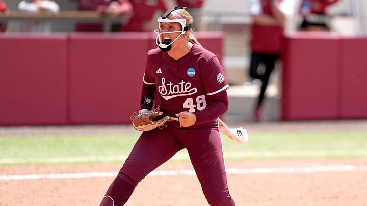 Mississippi State's Delainey Everett celebrates a strikeout for the final out during Game 1 of the NCAA Norman Super Regional softball game between the Mississippi State Bulldogs and the University of Oklahoma Sooners at Love's Field in Norman, Oklahoma. May 22, 2026. Mississippi State's Delainey Everett celebrates a strikeout for the final out during Game 1 of the NCAA Norman Super Regional softball game between the Mississippi State Bulldogs and the University of Oklahoma Sooners at Love's Field in Norman, Oklahoma. May 22, 2026.