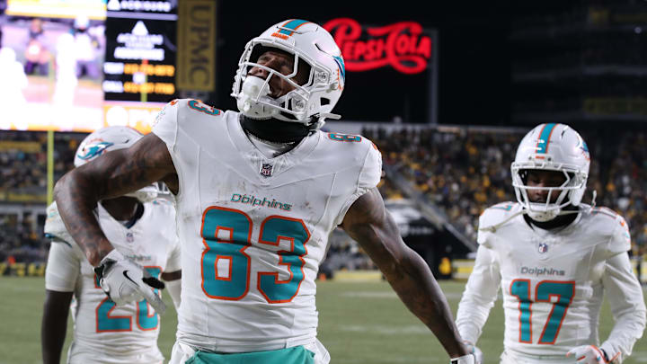 Miami Dolphins tight end Darren Waller (83) reacts after scoring a touchdown in the fourth quarter against the Pittsburgh Steelers at Acrisure Stadium last December.