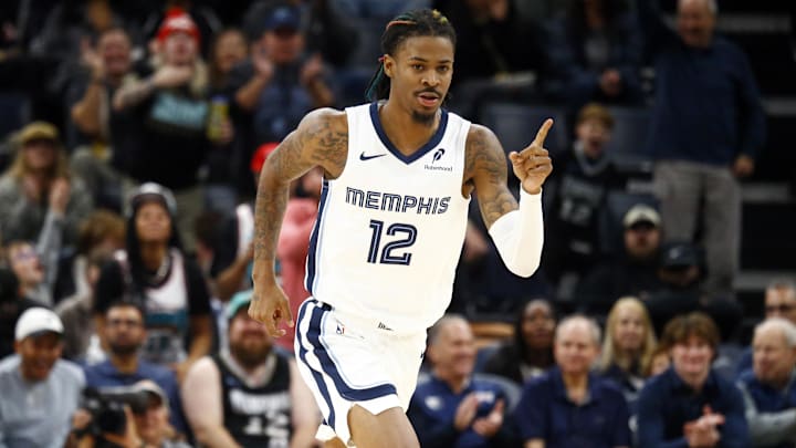  Memphis Grizzlies guard Ja Morant (12) reacts during the first half against the Portland Trail Blazers at FedExForum. Mandatory Credit: Petre Thomas-Imagn Images