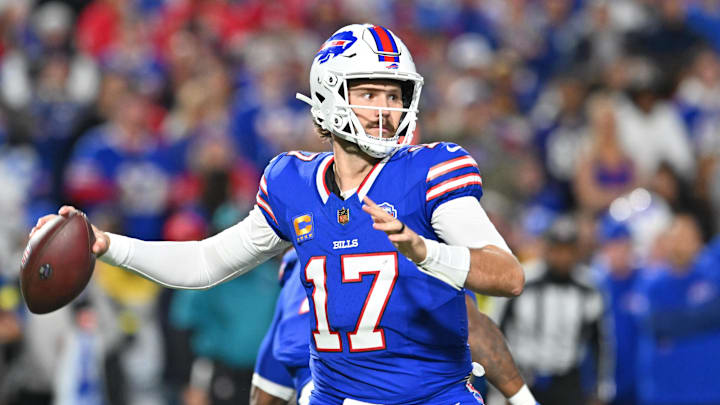 Buffalo Bills quarterback Josh Allen (17) passes the ball against the Baltimore Ravens during the first half at Highmark Stadium. 
