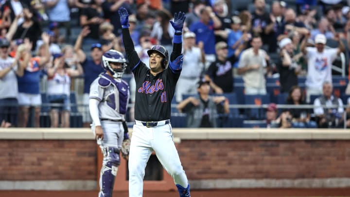 Jul 12, 2024; New York City, New York, USA;  New York Mets second baseman Jose Iglesias (11) celebrates after hitting a solo home run in the second inning against the Colorado Rockies at Citi Field.
