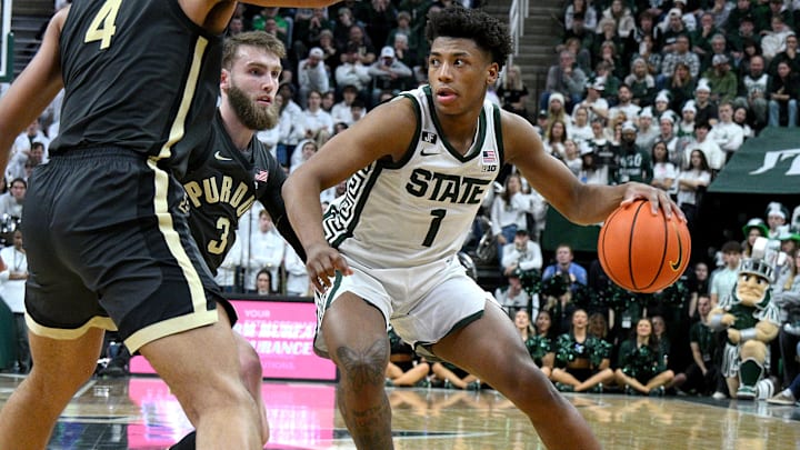 Feb 18, 2025; East Lansing, Michigan, USA;  Michigan State Spartans guard Jeremy Fears Jr. (1) drives to the paint against the Purdue Boilermakers during the second half at Jack Breslin Student Events Center. Mandatory Credit: Dale Young-Imagn Images