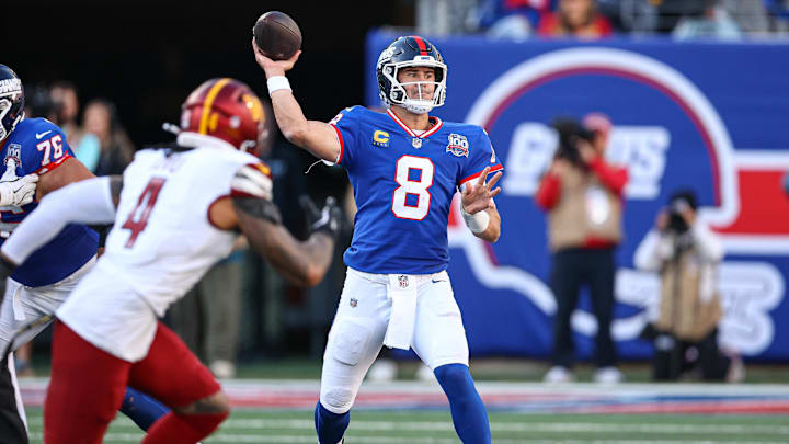 Nov 3, 2024; East Rutherford, New Jersey, USA; New York Giants quarterback Daniel Jones (8) throws the ball as Washington Commanders linebacker Frankie Luvu (4) defends during the second half at MetLife Stadium. Mandatory Credit: Vincent Carchietta-Imagn Images Nov 3, 2024; East Rutherford, New Jersey, USA; New York Giants quarterback Daniel Jones (8) throws the ball as Washington Commanders linebacker Frankie Luvu (4) defends during the second half at MetLife Stadium. Mandatory Credit: Vincent Carchietta-Imagn Images