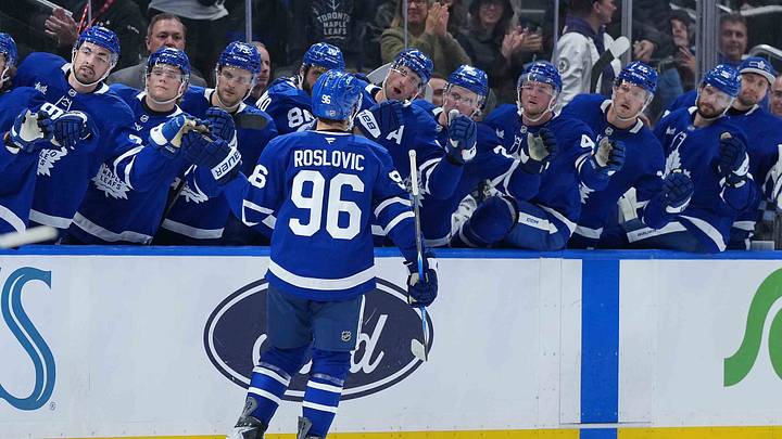 Oct 6, 2026; Toronto, Ontario, CAN;  Toronto Maple Leafs center Jack Roslovic (96) celebrates at the bench after scoring a goal against the Nashville Predators during the third period at Scotiabank Arena.  Mandatory Credit: Nick Turchiaro-Imagn Images