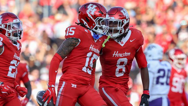 Nov 22, 2025; Houston, Texas, USA; Houston Cougars defensive back Will James (15) celebrates with defensive back Kentrell Webb (8) after an interception during the second quarter against the TCU Horned Frogs at TDECU Stadium. Mandatory Credit: Troy Taormina-Imagn Images Nov 22, 2025; Houston, Texas, USA; Houston Cougars defensive back Will James (15) celebrates with defensive back Kentrell Webb (8) after an interception during the second quarter against the TCU Horned Frogs at TDECU Stadium. Mandatory Credit: Troy Taormina-Imagn Images
