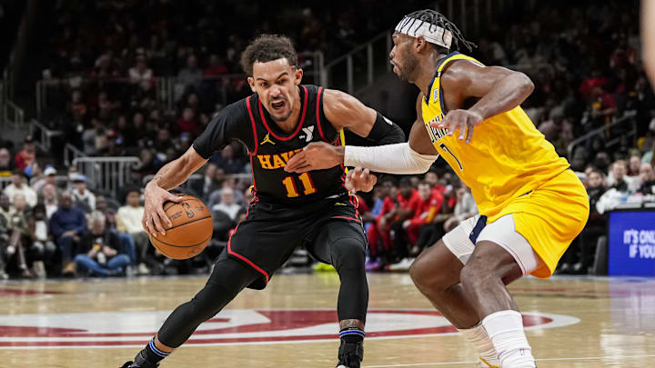 Jan 12, 2024; Atlanta, Georgia, USA; Atlanta Hawks guard Trae Young (11) is defended by Indiana Pacers guard Buddy Hield (7) during the second half at State Farm Arena. Mandatory Credit: Dale Zanine-Imagn Images Jan 12, 2024; Atlanta, Georgia, USA; Atlanta Hawks guard Trae Young (11) is defended by Indiana Pacers guard Buddy Hield (7) during the second half at State Farm Arena. Mandatory Credit: Dale Zanine-Imagn Images