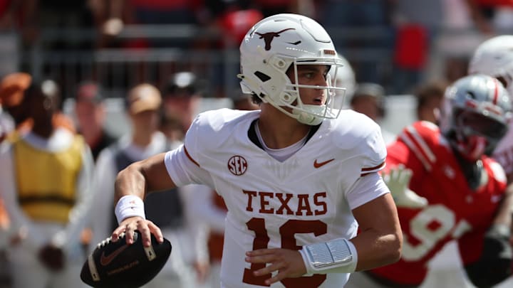 Aug 30, 2025; Columbus, Ohio, USA; Texas Longhorns quarterback Arch Manning (16) drops back to pass against the Ohio State Buckeyes in the first half at Ohio Stadium. Mandatory Credit: Joseph Maiorana-Imagn Images