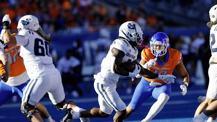 Oct 5, 2024; Boise, Idaho, USA; Utah State Aggies running back Rahsul Faison (3) runs for gain during the first quarter against the Boise State Broncos at Albertsons Stadium. Mandatory Credit: Brian Losness-Imagn Images
Oct 5, 2024; Boise, Idaho, USA; Utah State Aggies running back Rahsul Faison (3) runs for gain during the first quarter against the Boise State Broncos at Albertsons Stadium. Mandatory Credit: Brian Losness-Imagn Images