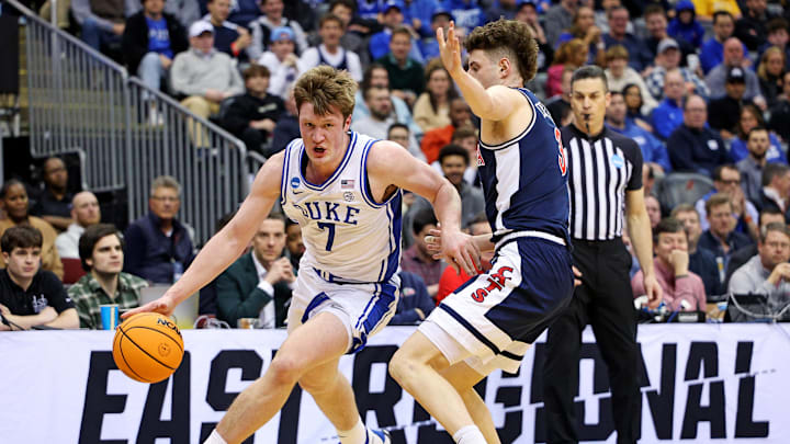 Mar 27, 2025; Newark, NJ, USA; Duke Blue Devils guard Kon Knueppel (7) shoots the ball against Arizona Wildcats guard Anthony Dell'Orso (3) during the first half during an East Regional semifinal of the 2025 NCAA tournament at Prudential Center. Mandatory Credit: Vincent Carchietta-Imagn Images Mar 27, 2025; Newark, NJ, USA; Duke Blue Devils guard Kon Knueppel (7) shoots the ball against Arizona Wildcats guard Anthony Dell'Orso (3) during the first half during an East Regional semifinal of the 2025 NCAA tournament at Prudential Center. Mandatory Credit: Vincent Carchietta-Imagn Images