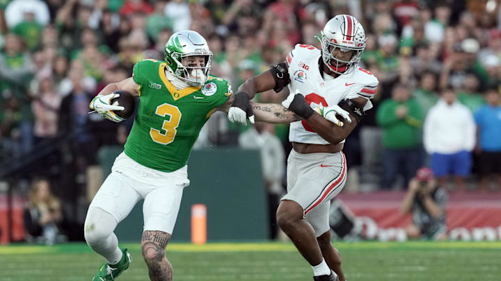 Jan 1, 2025; Pasadena, CA, USA; Oregon Ducks tight end Terrance Ferguson (3) runs against Ohio State Buckeyes safety Sonny Styles (6) in the third quarter in the 2025 Rose Bowl college football quarterfinal game at Rose Bowl Stadium. Mandatory Credit: Kirby Lee-Imagn Images