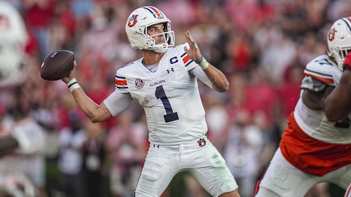 Oct 5, 2024; Athens, Georgia, USA; Auburn Tigers quarterback Payton Thorne (1) passes against the Georgia Bulldogs at Sanford Stadium. Mandatory Credit: Dale Zanine-Imagn Images