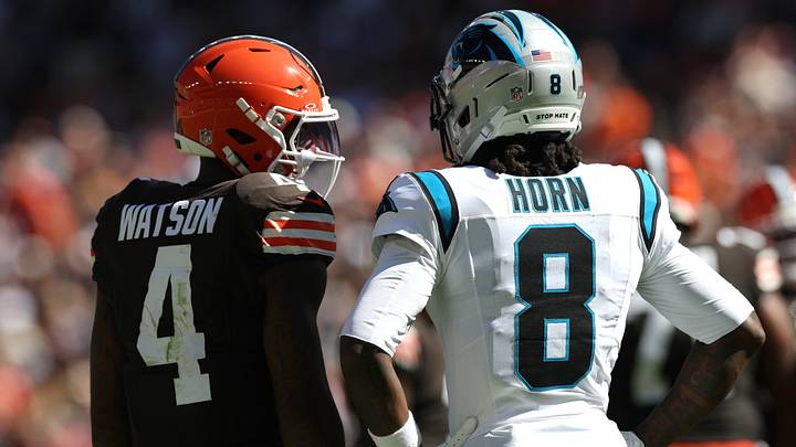 Sep 27, 2026; Cleveland, Ohio, USA;  Cleveland Browns quarterback Deshaun Watson (4) speaks with Carolina Panthers cornerback Jaycee Horn (8) during the second quarter at Huntington Bank Field.  Mandatory Credit: Scott Galvin-Imagn Images