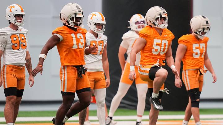 Tennessee linebacker Edwin Spillman (13) and Tennessee linebacker Ryan Scott (50) during the Vols' first spring football practice in Knoxville on March 16, 2026. Tennessee linebacker Edwin Spillman (13) and Tennessee linebacker Ryan Scott (50) during the Vols' first spring football practice in Knoxville on March 16, 2026.
