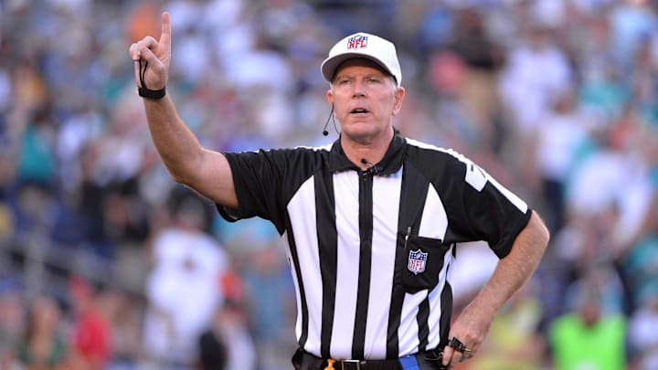 Nov 13, 2016; San Diego, CA, USA; referee Terry McAulay (77) announces a penalty during the second half of the game between the San Diego Chargers and Miami Dolphins at Qualcomm Stadium. Miami won 31-24. Mandatory Credit: Orlando Ramirez-Imagn Images