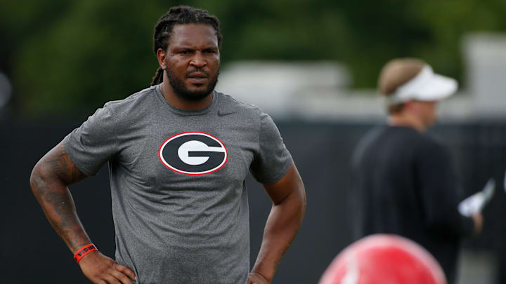 FILE - Jarvis Jones works with the Georgia defense during an NCAA college football practice in Athens, Ga., Friday, Aug. 2, 2019. Former Georgia and NFL linebacker Jarvis Jones, who now works on the football staff at his alma mater, was arrested for speeding and reckless driving ahead of the Bulldogs' season opener. Jones' arrest late Friday, Sept. 1, 2023, is the latest driving incident to tarnish the two-time reigning national champions. (Joshua L. Jones/Athens Banner-Herald via AP, File) FILE - Jarvis Jones works with the Georgia defense during an NCAA college football practice in Athens, Ga., Friday, Aug. 2, 2019. Former Georgia and NFL linebacker Jarvis Jones, who now works on the football staff at his alma mater, was arrested for speeding and reckless driving ahead of the Bulldogs' season opener. Jones' arrest late Friday, Sept. 1, 2023, is the latest driving incident to tarnish the two-time reigning national champions. (Joshua L. Jones/Athens Banner-Herald via AP, File)