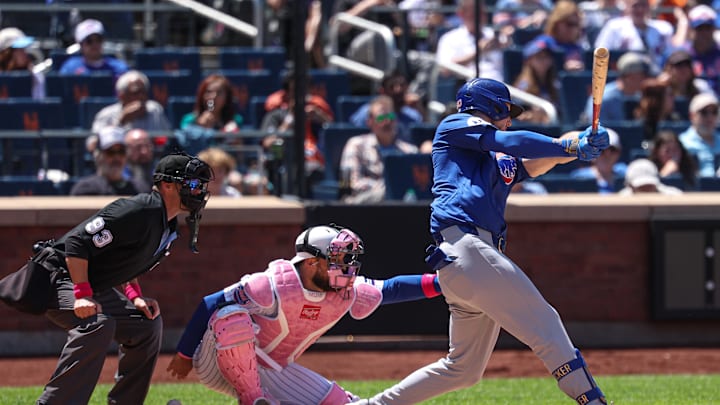 New York Mets catcher Luis Torrens (13) is hit by a foul ball by Chicago Cubs right fielder Kyle Tucker (30) during the sixth inning at Citi Field. Torrens would leave the game due to an injury after the play on May 11.