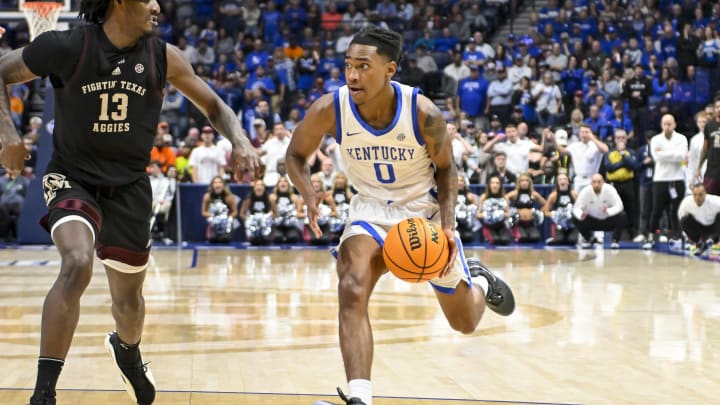 Mar 15, 2024; Nashville, TN, USA;  Kentucky Wildcats guard Rob Dillingham (0) drives to the basket against the Texas A&M Aggies during the second half at Bridgestone Arena. Mandatory Credit: Steve Roberts-USA TODAY Sports