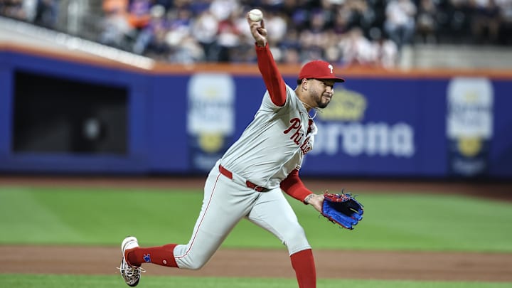 Sep 19, 2024; New York City, New York, USA;  Philadelphia Phillies starting pitcher Taijuan Walker (99) pitches in the first inning against the New York Mets at Citi Field.