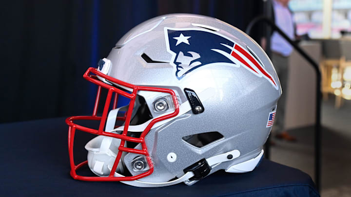 Jan 17, 2024; Foxborough, MA, USA; A New England Patriots helmet sits on a table prior to a press conference at Gillette Stadium. Mandatory Credit: Eric Canha-Imagn Images