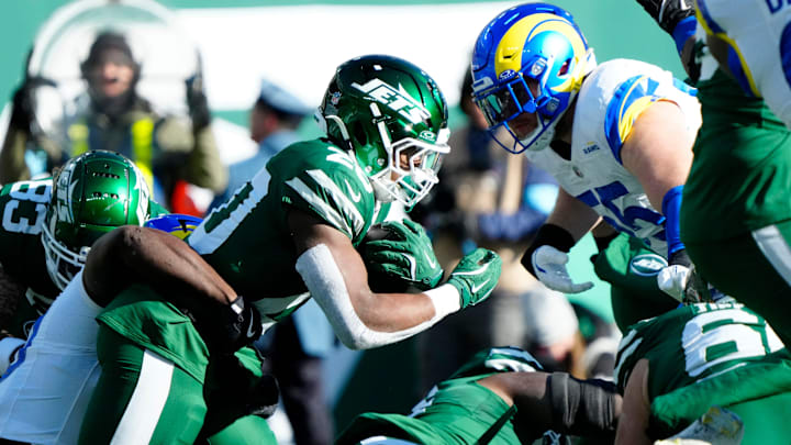 New York Jets running back Breece Hall (20) runs with the ball against the Los Angeles Chargers, Sunday, December 22, 2024. New York Jets running back Breece Hall (20) runs with the ball against the Los Angeles Chargers, Sunday, December 22, 2024.