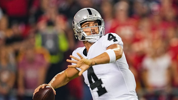 Oct 10, 2022; Kansas City, Missouri, USA; Las Vegas Raiders quarterback Derek Carr (4) throws a pass during the first half against the Kansas City Chiefs at GEHA Field at Arrowhead Stadium. Mandatory Credit: Jay Biggerstaff-Imagn Images