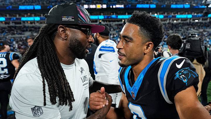Detroit Lions defensive coordinator Kelvin Sheppard, left, shakes hands with Carolina Panthers quarterback Bryce Young (9) after 32-26 loss to Carolina Panthers at Bank of America Stadium in Charlotte on Sunday, Oct. 4, 2026. Detroit Lions defensive coordinator Kelvin Sheppard, left, shakes hands with Carolina Panthers quarterback Bryce Young (9) after 32-26 loss to Carolina Panthers at Bank of America Stadium in Charlotte on Sunday, Oct. 4, 2026.