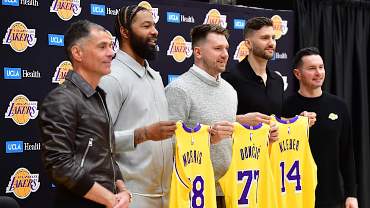 Feb 4, 2025; El Segundo, CA, USA; Los Angeles Lakers guard Luka Doncic, forward Max Kleber, forward Markieff Morris, vice president of basketball operations Rob Pelinka and head coach JJ Redick pose for photos at UCLA Health Training Center. Mandatory Credit: Gary A. Vasquez-Imagn Images