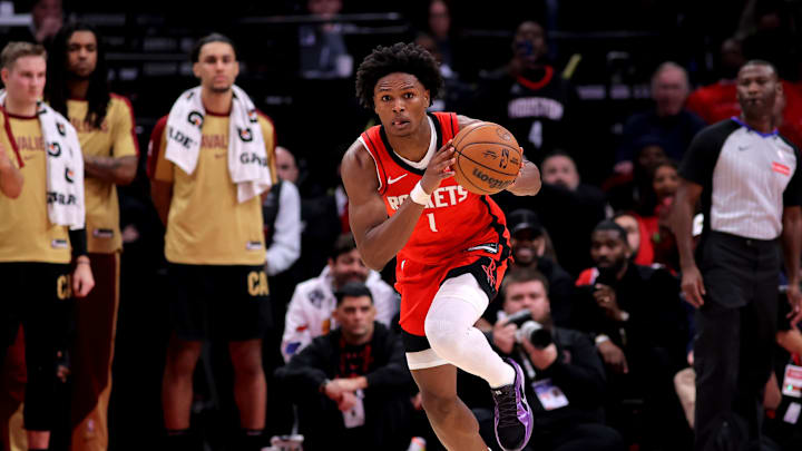 Jan 22, 2025; Houston, Texas, USA; Houston Rockets guard Amen Thompson (1) handles the ball after a steal against the Cleveland Cavaliers during the fourth quarter at Toyota Center. Mandatory Credit: Erik Williams-Imagn Images