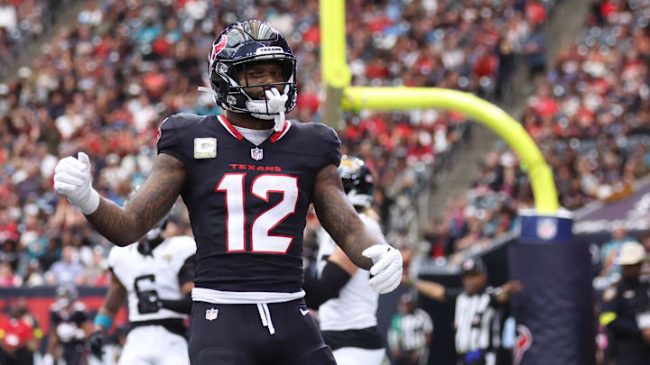 Nov 9, 2025; Houston, Texas, USA; Houston Texans wide receiver Nico Collins (12) reacts after an incomplete pass against the Jacksonville Jaguars during the first half at NRG Stadium. Mandatory Credit: Troy Taormina-Imagn Images