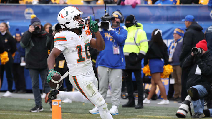 Nov 29, 2025; Pittsburgh, Pennsylvania, USA; Miami Hurricanes wide receiver Malachi Toney (10) reacts to the Panthers student section after catching a touchdown pass against the Pittsburgh Panthers during the second quarter at Acrisure Stadium. Mandatory Credit: Charles LeClaire-Imagn Images Nov 29, 2025; Pittsburgh, Pennsylvania, USA; Miami Hurricanes wide receiver Malachi Toney (10) reacts to the Panthers student section after catching a touchdown pass against the Pittsburgh Panthers during the second quarter at Acrisure Stadium. Mandatory Credit: Charles LeClaire-Imagn Images