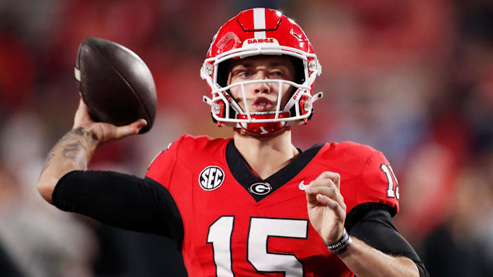 Georgia quarterback Carson Beck (15) warms up before the start of a NCAA college football game