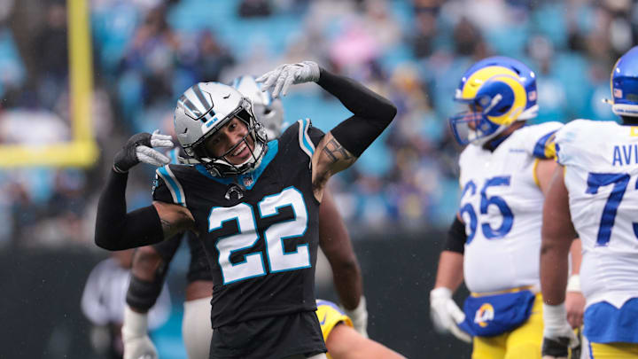 Nov 30, 2025; Charlotte, North Carolina, USA;  Carolina Panthers safety Lathan Ransom (22) celebrates after a play during the third quarter against the Los Angeles Rams at Bank of America Stadium. Mandatory Credit: Scott Kinser-Imagn Images