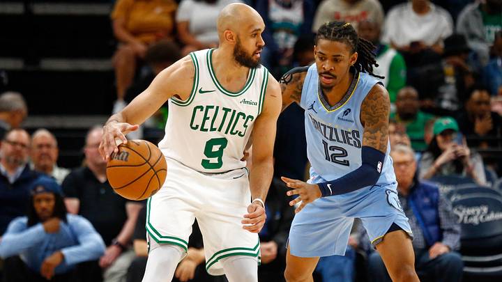 Mar 31, 2025; Memphis, Tennessee, USA; Boston Celtics guard Derrick White (9) dribbles as Memphis Grizzlies guard Ja Morant (12) defends during the third quarter at FedExForum. Mandatory Credit: Petre Thomas-Imagn Images Mar 31, 2025; Memphis, Tennessee, USA; Boston Celtics guard Derrick White (9) dribbles as Memphis Grizzlies guard Ja Morant (12) defends during the third quarter at FedExForum. Mandatory Credit: Petre Thomas-Imagn Images