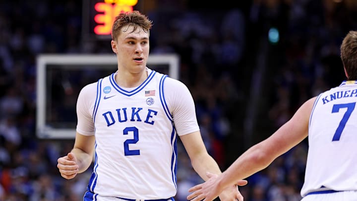 Mar 29, 2025; Newark, NJ, USA; Duke Blue Devils forward Cooper Flagg (2) celebrates with guard Kon Knueppel (7) during the second half against the Alabama Crimson Tide in the East Regional final of the 2025 NCAA tournament at Prudential Center. Mandatory Credit: Vincent Carchietta-Imagn Images
