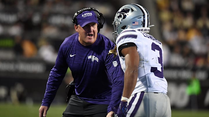 Oct 12, 2024; Boulder, Colorado, USA; Kansas State Wildcats running back Dylan Edwards (3) celebrates with head coach Chris Klieman after a touchdown during the first half against the Colorado Buffaloes at Folsom Field. Mandatory Credit: Christopher Hanewinckel-Imagn Images