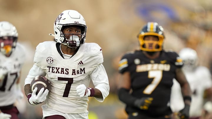 Nov 8, 2025; Columbia, Missouri, USA; Texas A&M Aggies wide receiver KC Concepcion (7) runs for a touchdown during the second half against the Missouri Tigers at Faurot Field at Memorial Stadium. Mandatory Credit: Jay Biggerstaff-Imagn Images