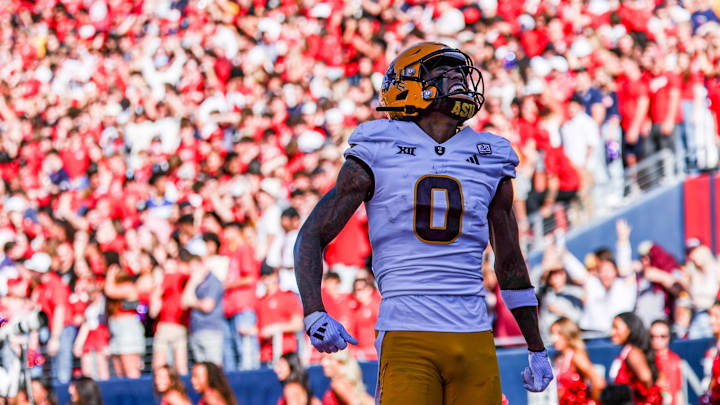 Nov 30, 2024; Tucson, Arizona, USA; Arizona State Sun Devils wide receiver Jordyn Tyson (0) celebrates a first down during the first half against the Arizona Wildcats at Arizona Stadium. Mandatory Credit: Aryanna Frank-Imagn Images Nov 30, 2024; Tucson, Arizona, USA; Arizona State Sun Devils wide receiver Jordyn Tyson (0) celebrates a first down during the first half against the Arizona Wildcats at Arizona Stadium. Mandatory Credit: Aryanna Frank-Imagn Images