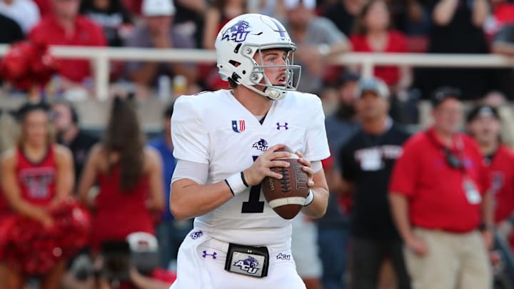 Abilene Christian Wildcats quarterback Maverick McIvor passes against the Texas Tech Red Raiders 