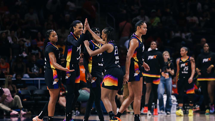 Jul 27, 2025; Washington, District of Columbia, USA; Phoenix Mercury players celebrate at the final buzzer after the game against the Washington Mystics at CareFirst Arena. Mandatory Credit: Emily Faith Morgan-Imagn Images