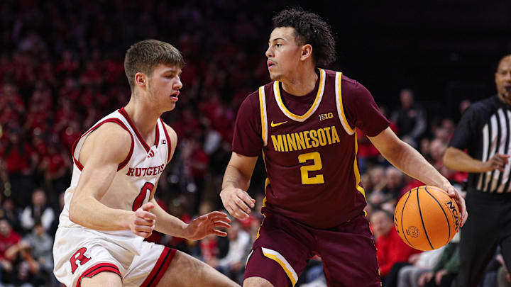 Mar 9, 2025; Piscataway, New Jersey, USA; Minnesota Golden Gophers guard Mike Mitchell Jr. (2) is guarded by Rutgers Scarlet Knights guard Jordan Derkack (0) during the first half at Jersey Mike's Arena. Mandatory Credit: Vincent Carchietta-Imagn Images Mar 9, 2025; Piscataway, New Jersey, USA; Minnesota Golden Gophers guard Mike Mitchell Jr. (2) is guarded by Rutgers Scarlet Knights guard Jordan Derkack (0) during the first half at Jersey Mike's Arena. Mandatory Credit: Vincent Carchietta-Imagn Images