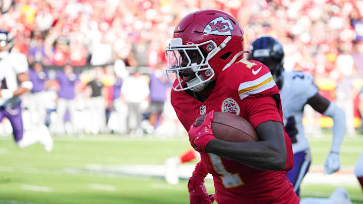 Kansas City Chiefs wide receiver Xavier Worthy (1) runs after making a catch during the second quarter against the Baltimore Ravens at GEHA Field at Arrowhead Stadium. 